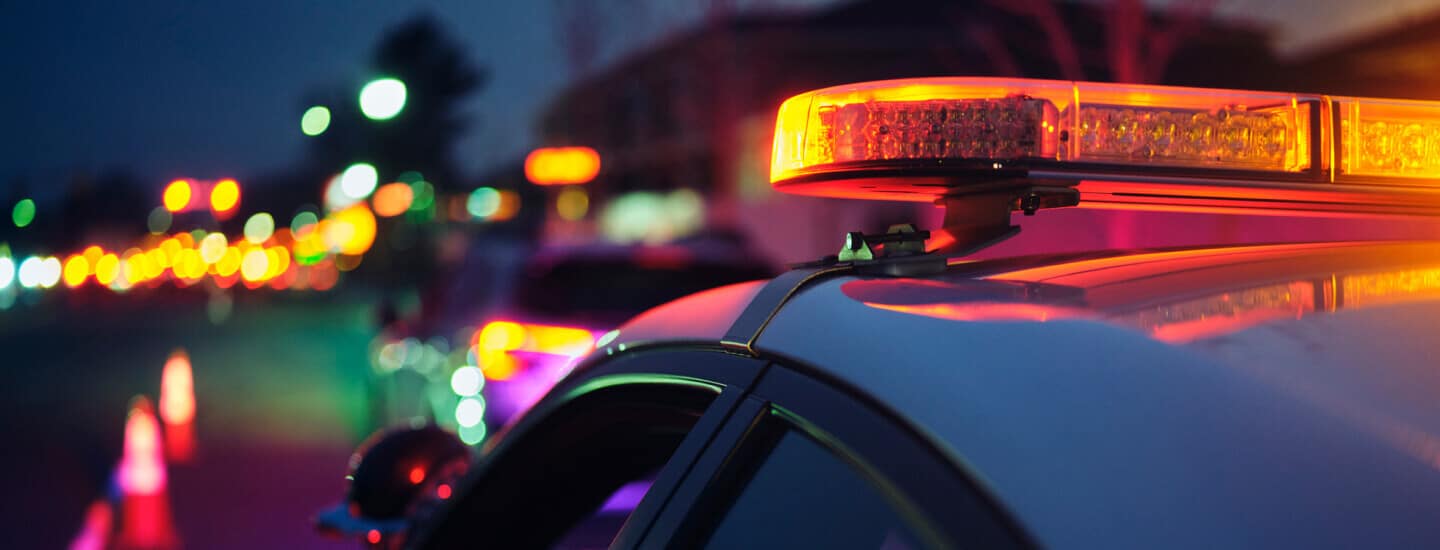 Close up image of the top of a police car.