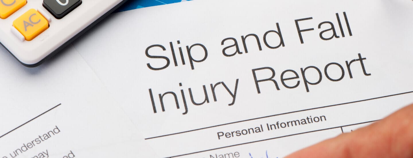 Close up image of a paper report titled "slip and fall injury report"